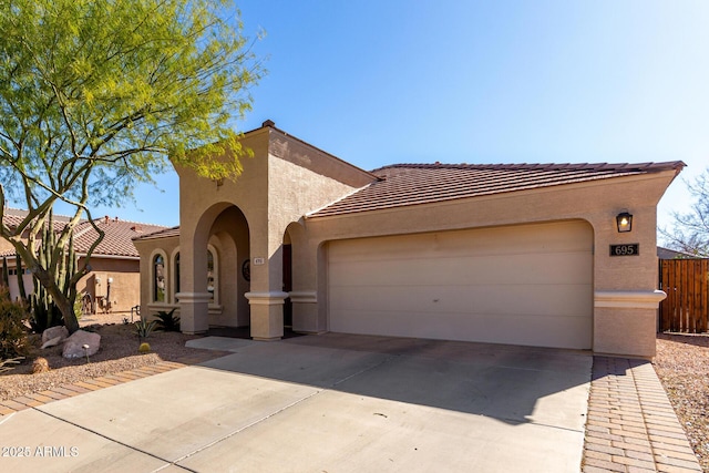 view of front of home with a garage