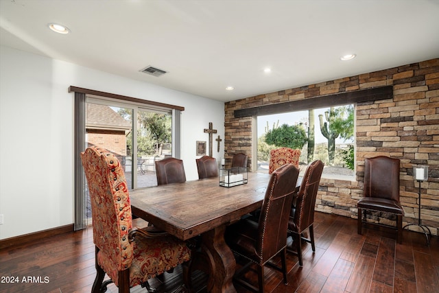 dining space featuring dark wood-type flooring