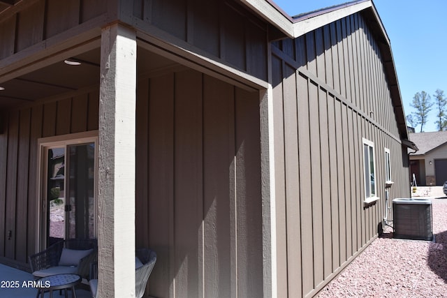 206 S Thunder Mtn, Payson, AZ 85541 - view of side of home featuring board and batten siding and central AC unit