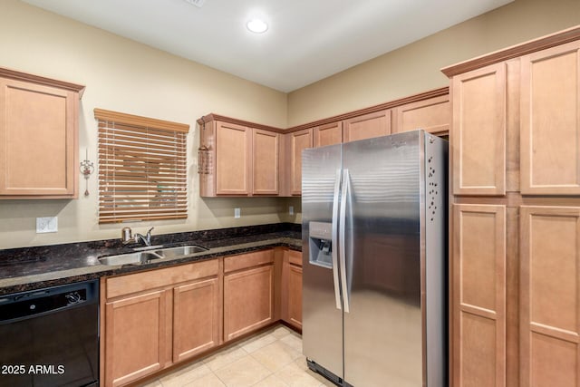 kitchen featuring light tile patterned floors, a sink, black dishwasher, stainless steel fridge with ice dispenser, and dark stone countertops