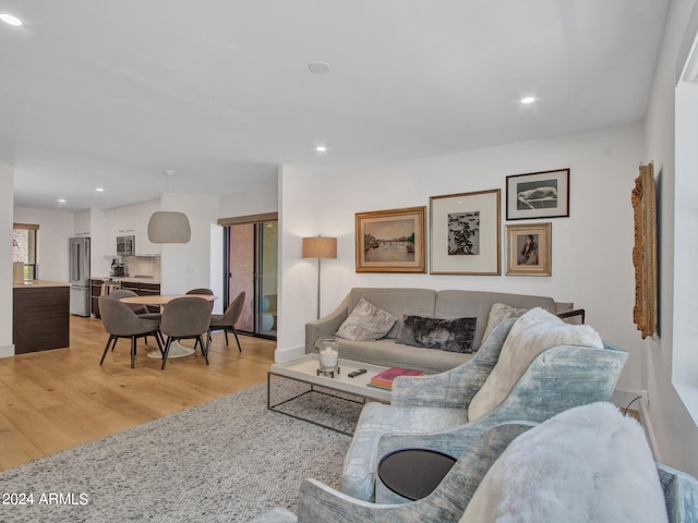 living room with light hardwood / wood-style floors