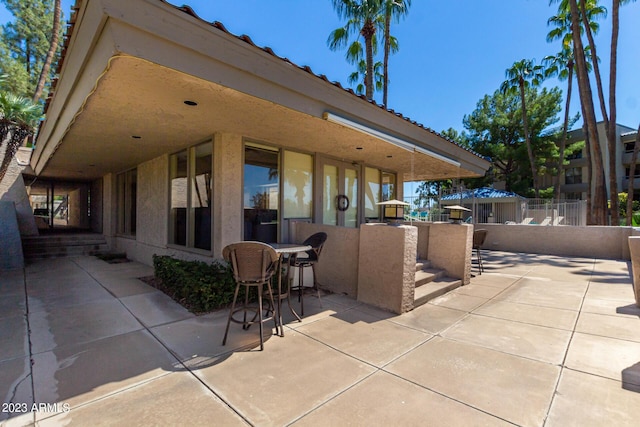 view of patio with fence