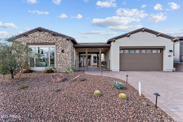 view of front of home with a garage