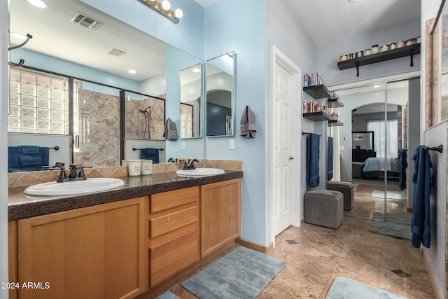 bathroom with vanity and walk in shower