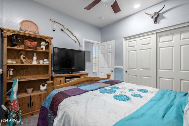 bedroom featuring a closet, carpet flooring, and ceiling fan