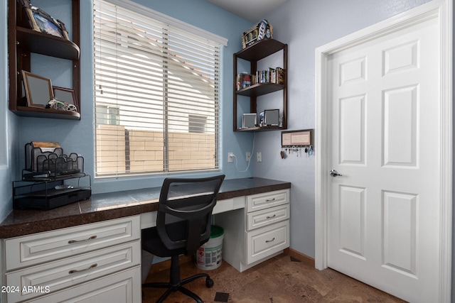 office area with built in desk