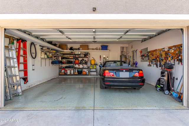 garage featuring strapped water heater