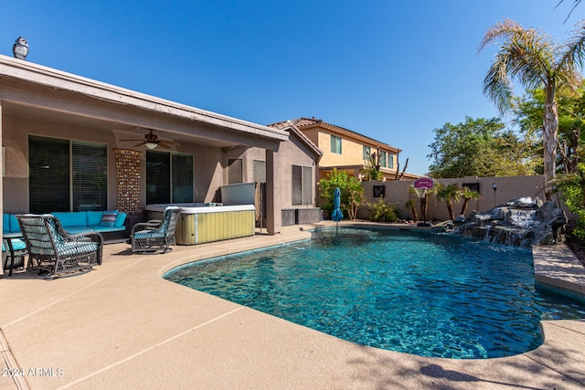 view of swimming pool with a patio area, a hot tub, an outdoor hangout area, ceiling fan, and pool water feature