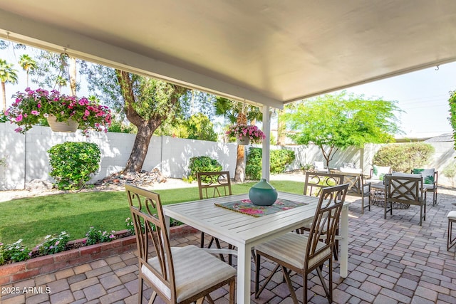 view of patio featuring outdoor dining space and an outdoor hangout area