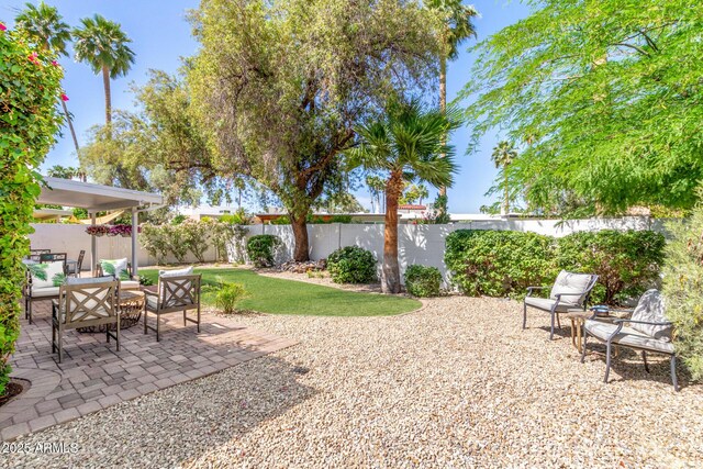 view of patio featuring a fenced backyard