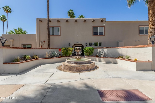 surrounding community featuring a patio area