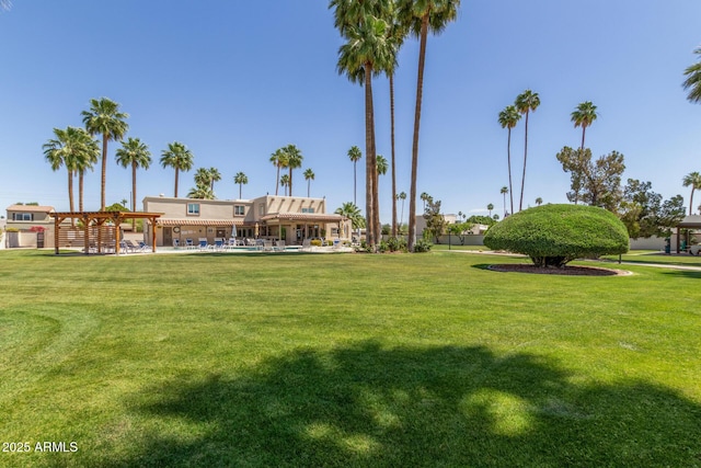 view of home's community featuring a lawn