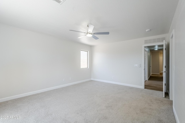 16159 W Maui Ln, Surprise, AZ 85379 - unfurnished room with a ceiling fan, baseboards, carpet floors, and a smoke detector