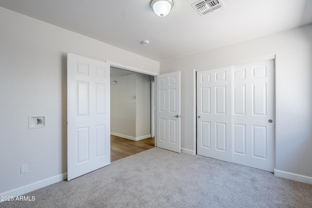 16159 W Maui Ln, Surprise, AZ 85379 - unfurnished bedroom featuring carpet flooring, a closet, and baseboards