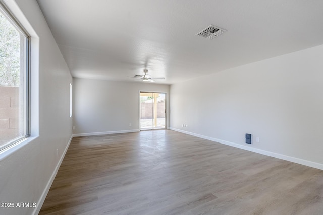 16159 W Maui Ln, Surprise, AZ 85379 - unfurnished room featuring light wood-type flooring, baseboards, and a ceiling fan