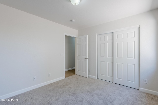 16159 W Maui Ln, Surprise, AZ 85379 - unfurnished bedroom featuring carpet, baseboards, and a closet