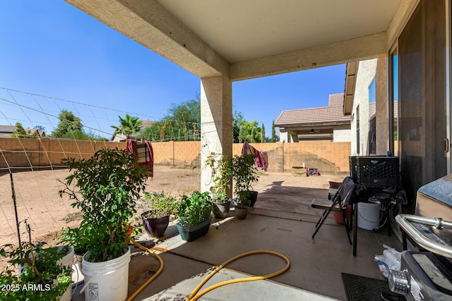 5654 W Vineyard Rd, Laveen, AZ 85339 - fenced backyard with a patio
