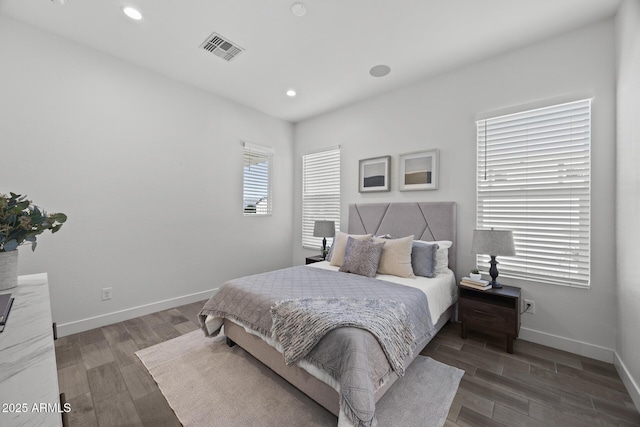 bedroom featuring dark hardwood / wood-style floors