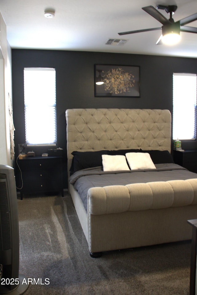 carpeted bedroom featuring ceiling fan