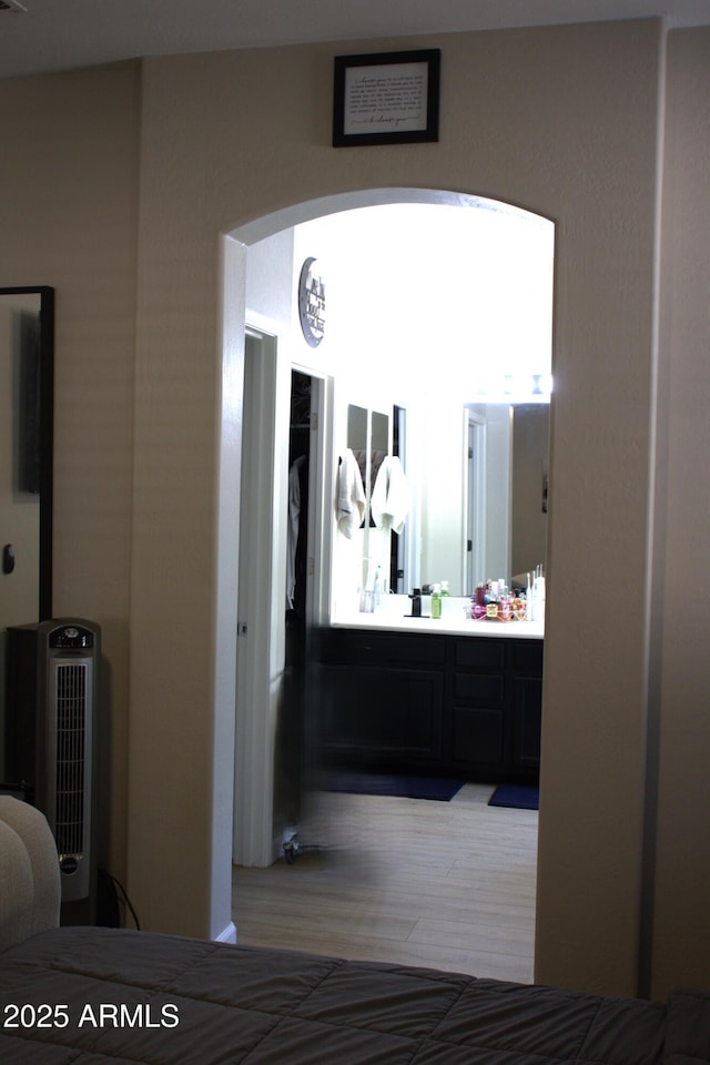 bedroom featuring light wood-type flooring