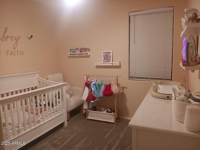 carpeted bedroom with a crib