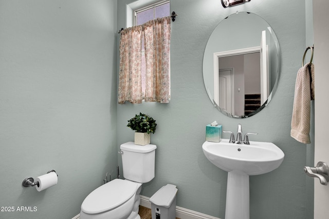 3036 N Acacia Way, Buckeye, AZ 85396 - bathroom with toilet and baseboards