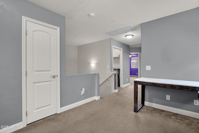 3036 N Acacia Way, Buckeye, AZ 85396 - corridor featuring an upstairs landing and light colored carpet