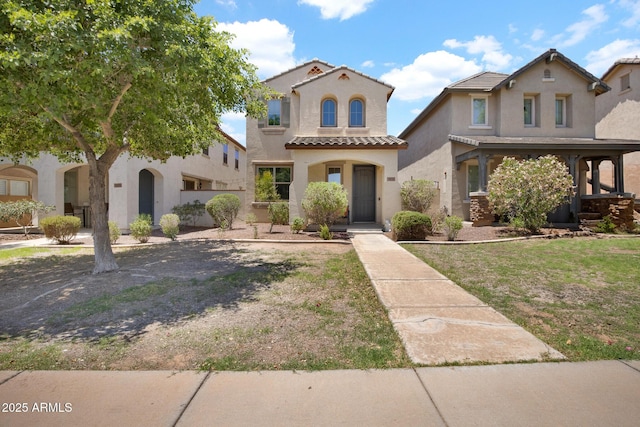 3036 N Acacia Way, Buckeye, AZ 85396 - mediterranean / spanish-style house featuring stucco siding and a tile roof