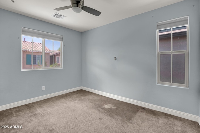 3036 N Acacia Way, Buckeye, AZ 85396 - carpeted empty room featuring a ceiling fan and baseboards