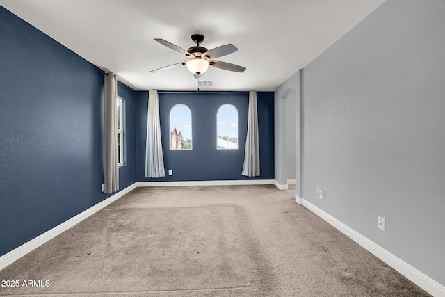 3036 N Acacia Way, Buckeye, AZ 85396 - spare room featuring ceiling fan and carpet