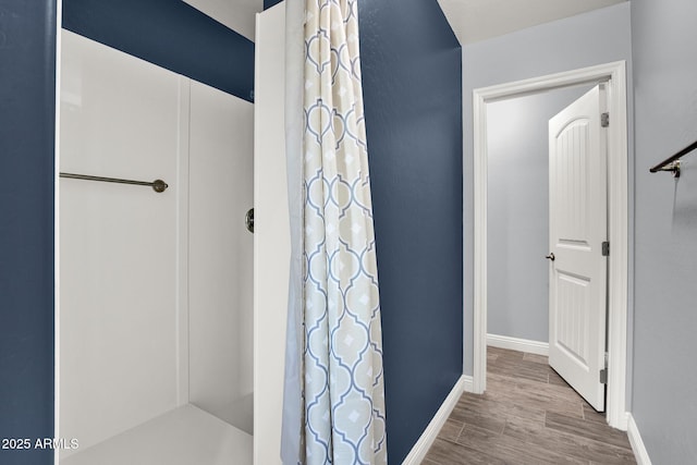 3036 N Acacia Way, Buckeye, AZ 85396 - full bath featuring wood finished floors and curtained shower