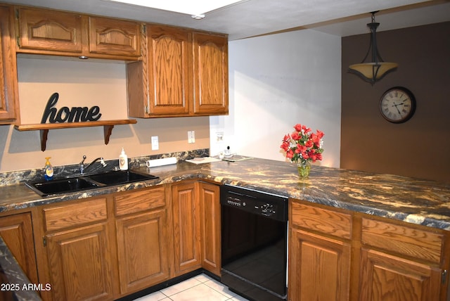 kitchen featuring dark stone countertops, dishwasher, light tile patterned flooring, and sink