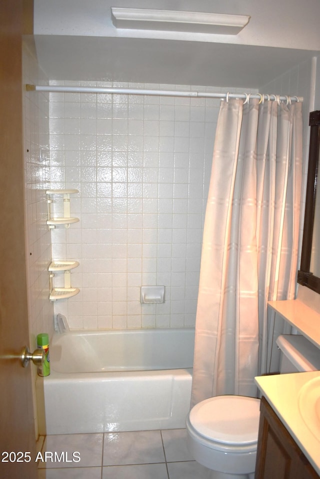 full bathroom featuring tile patterned flooring, shower / bath combination with curtain, toilet, and vanity