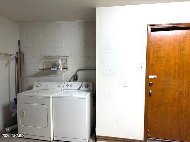 laundry room featuring separate washer and dryer