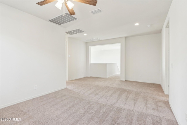 22987 E Pummelos Rd, Queen Creek, AZ 85142 - unfurnished room featuring visible vents, a ceiling fan, and light colored carpet