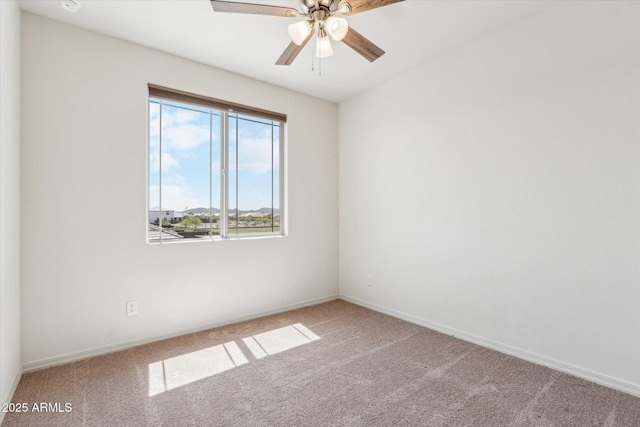 22987 E Pummelos Rd, Queen Creek, AZ 85142 - empty room featuring ceiling fan, carpet, and baseboards