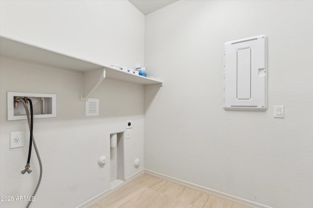 22987 E Pummelos Rd, Queen Creek, AZ 85142 - laundry area featuring laundry area, electric panel, washer hookup, gas dryer hookup, and baseboards