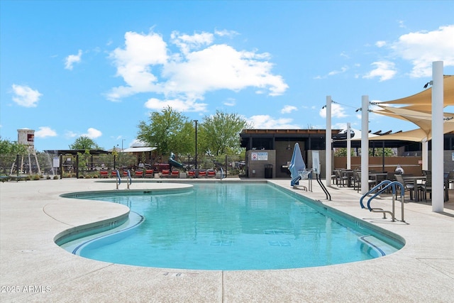 22987 E Pummelos Rd, Queen Creek, AZ 85142 - community pool featuring a patio and fence