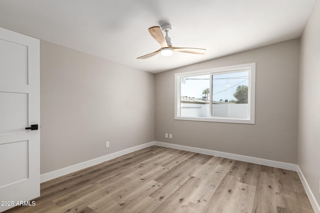 1920 N Cavalier Dr, Tempe, AZ 85288 - empty room with baseboards, a ceiling fan, and light wood finished floors