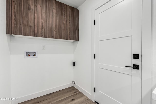 1920 N Cavalier Dr, Tempe, AZ 85288 - washroom featuring cabinet space, baseboards, wood finished floors, and washer hookup