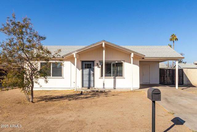 view of front of house featuring a carport