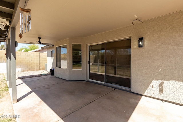 view of patio / terrace featuring fence