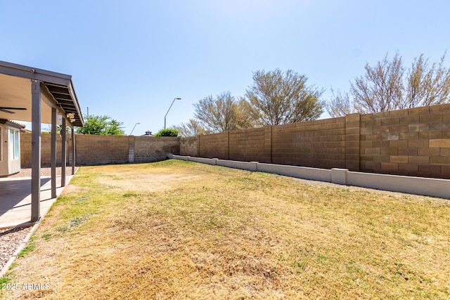 view of yard featuring a fenced backyard