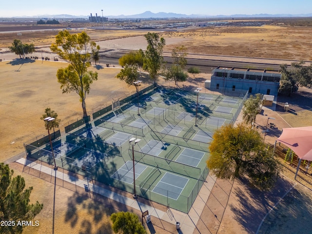 birds eye view of property with a mountain view