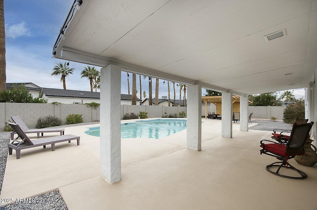 view of pool featuring a patio