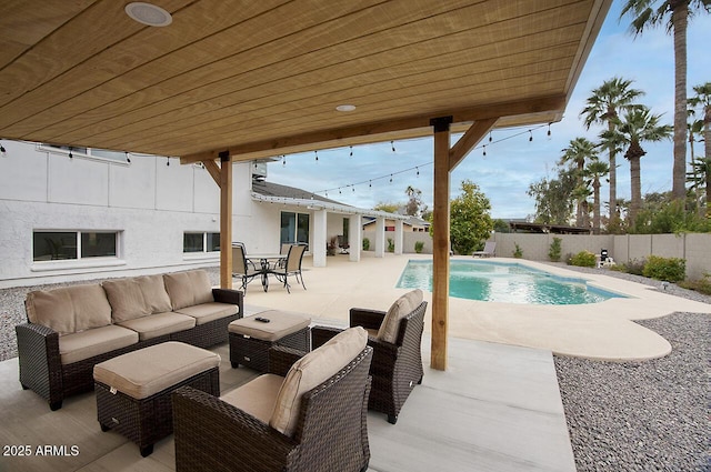 view of pool featuring a patio and outdoor lounge area