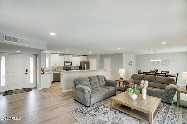 living room with light wood-type flooring