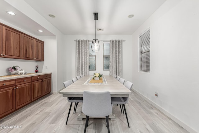 21472 E Saddle Ct, Queen Creek, AZ 85142 - dining space featuring light wood-style flooring, baseboards, and recessed lighting