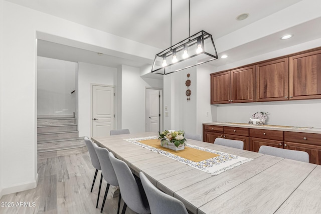 21472 E Saddle Ct, Queen Creek, AZ 85142 - dining space with stairway, recessed lighting, and light wood-style flooring