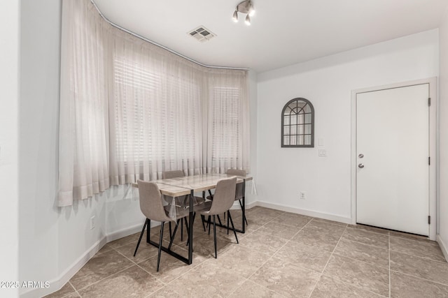 21472 E Saddle Ct, Queen Creek, AZ 85142 - dining room featuring baseboards